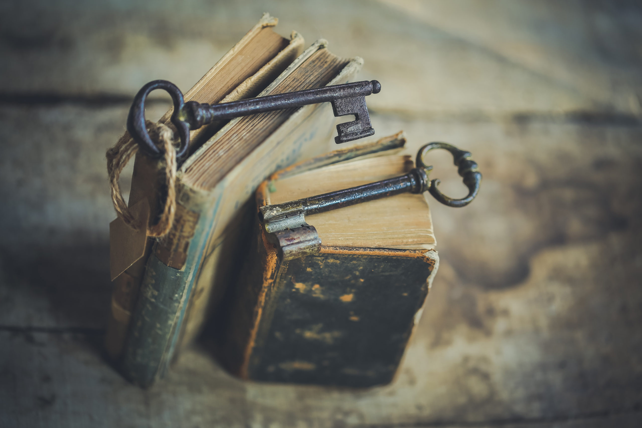 Books with keys set on top.
