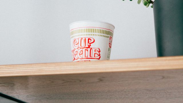 Cup Noodles sitting on a shelf