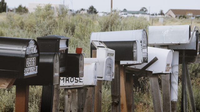A line of mailboxes in the countryside