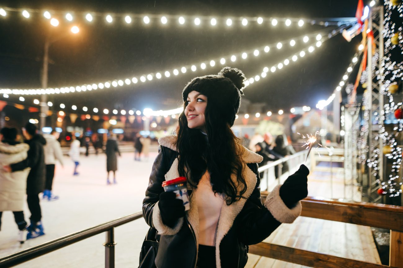 A happy girl celebrates Christmas in Finland