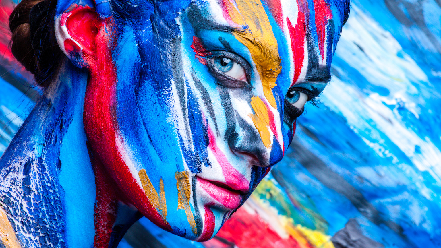 colorful paintings of faces