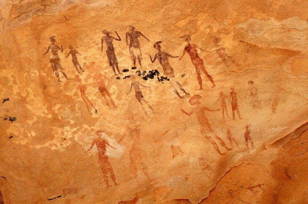 Rock paintings from Tassili n'Ajjer showing humans in their ancient tribes.