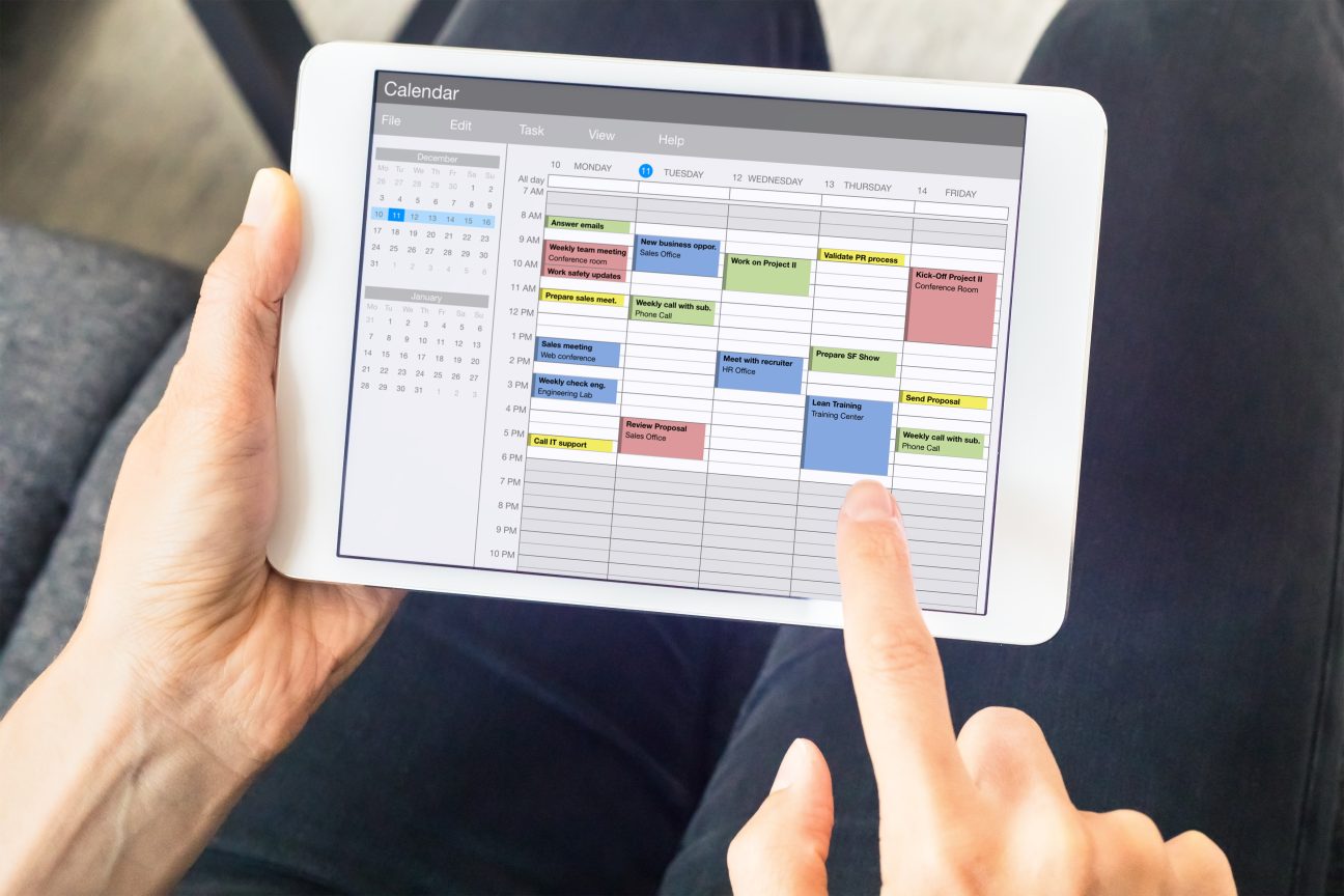 Calendar app shows a man's timeboxed schedule.