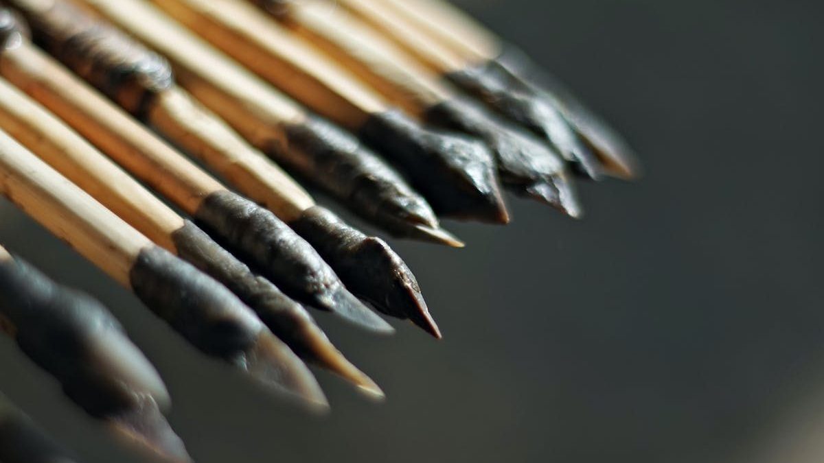 a close up of a bunch of wooden sticks.