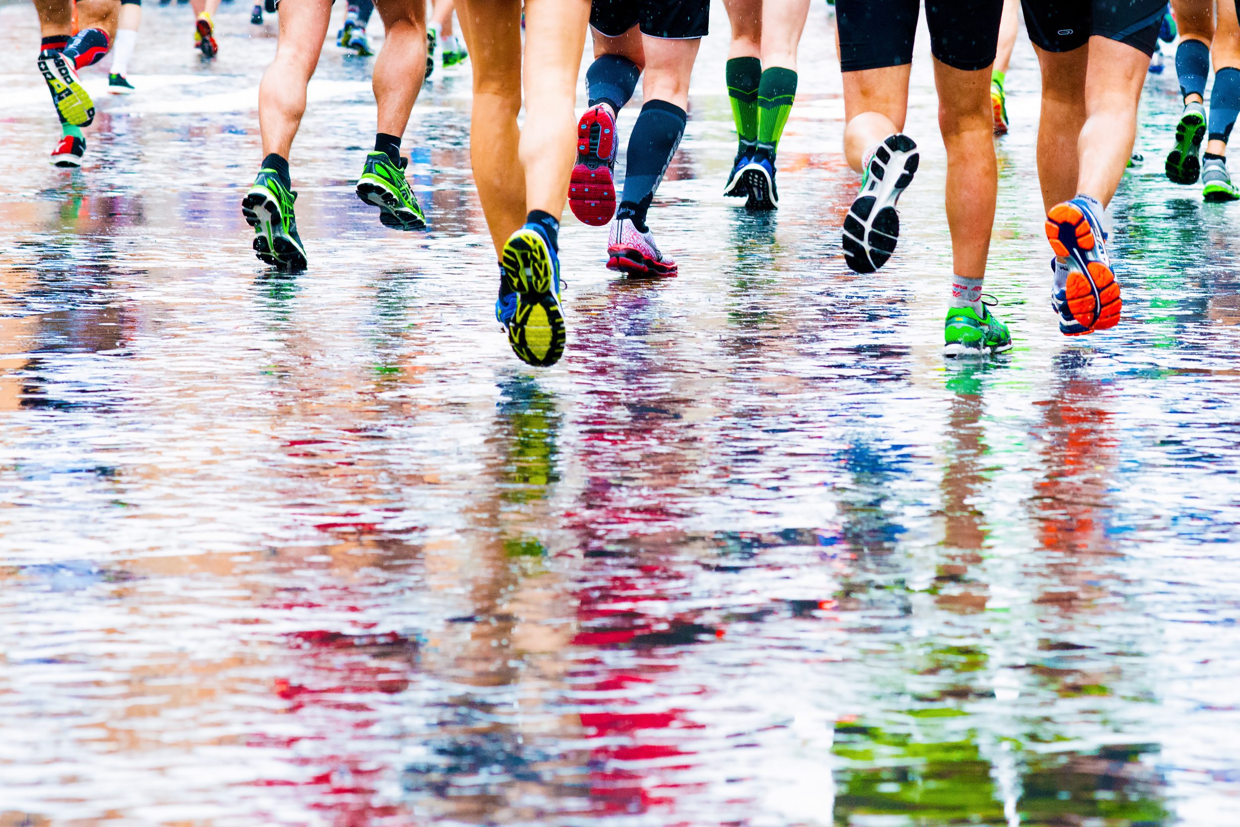 People running in the rain during a marathon