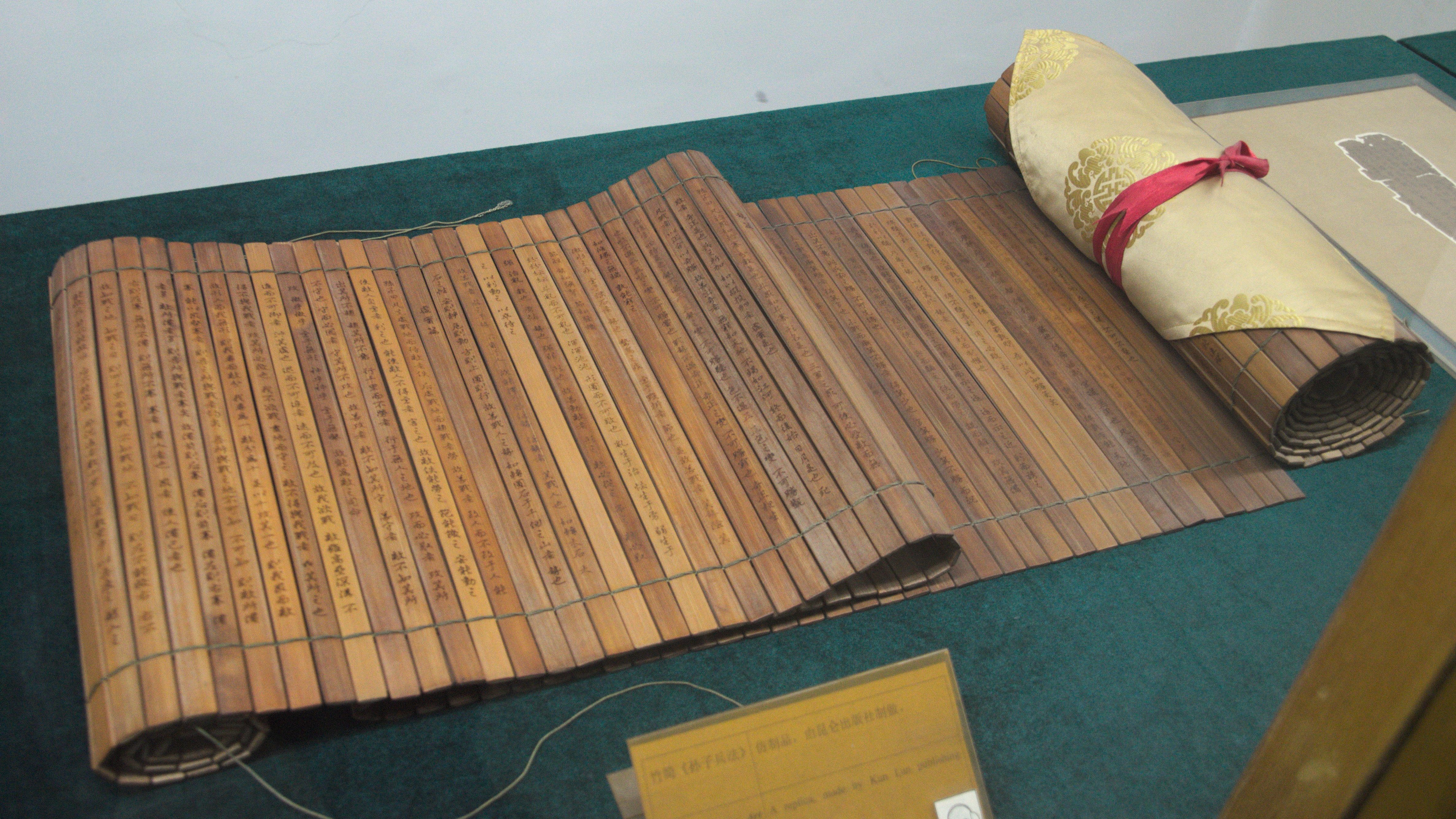 A replica of a bamboo tablettes roll