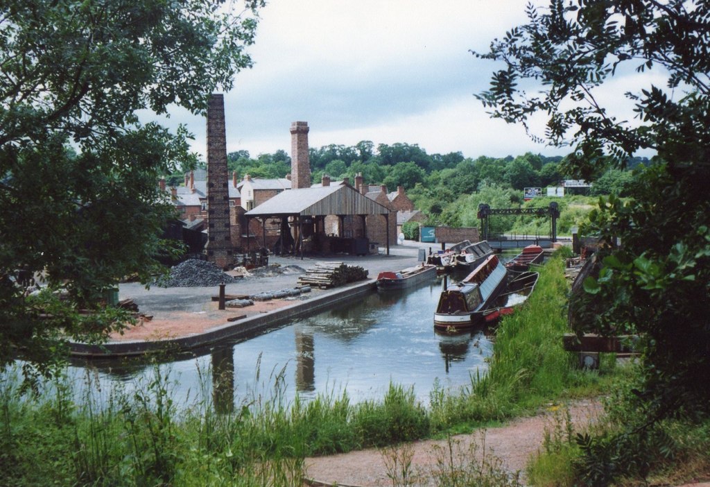 a river with a bunch of boats in it.