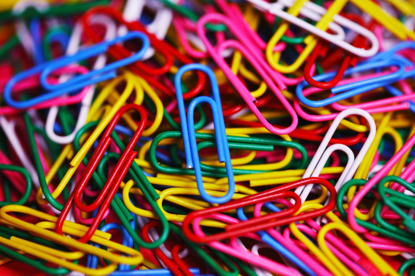 A pile of colorful paper clips.