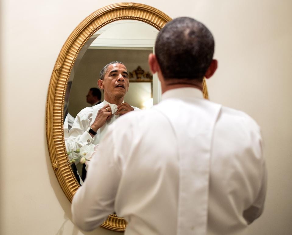 obama reflected in mirror