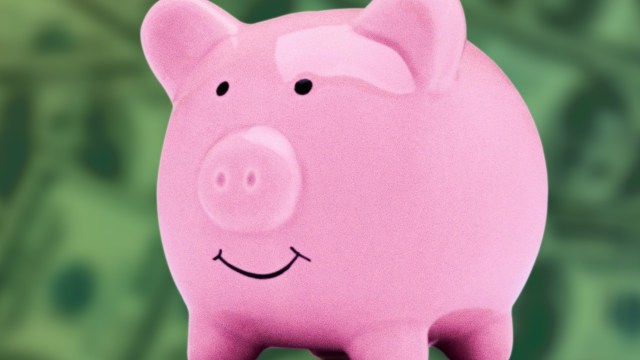 a pink pig with a smile on its face.