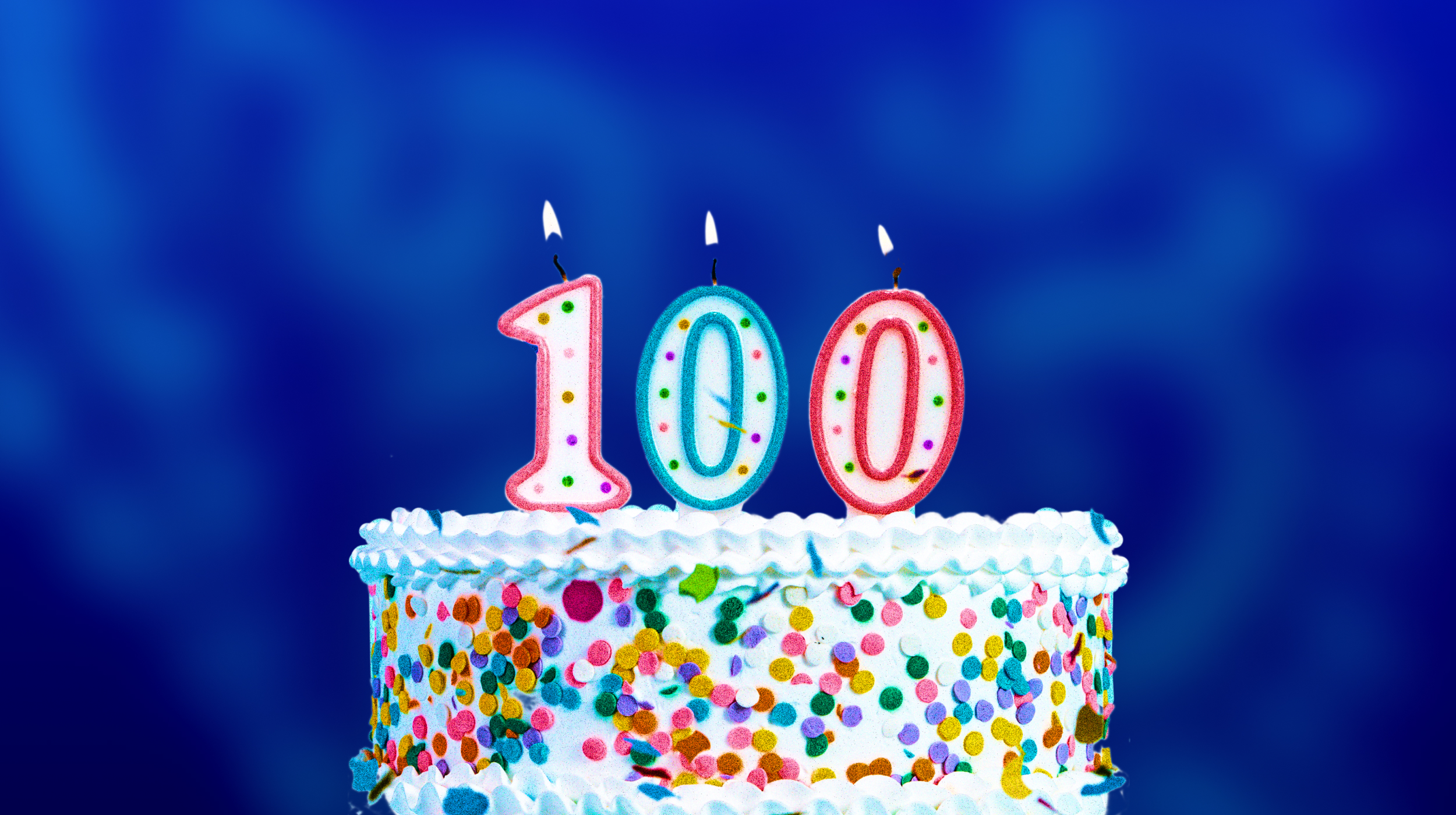 a birthday cake with the number 100 on it.