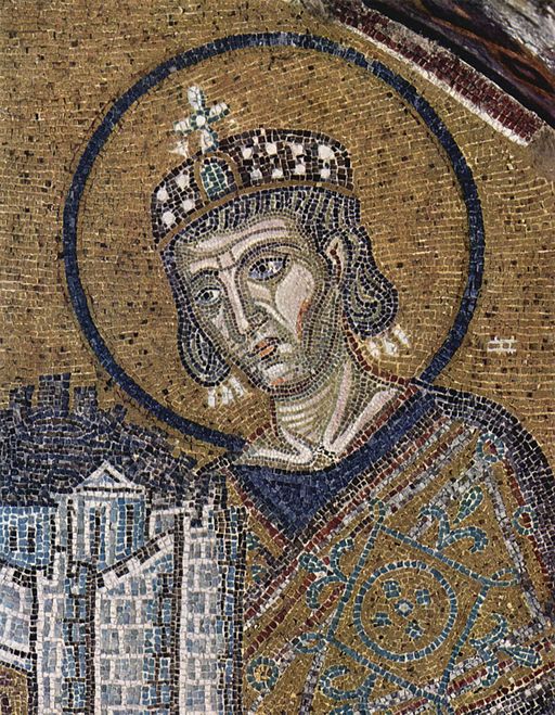 A mosaic depicting a man holding a crown.