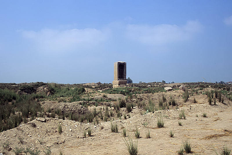 a towering structure amidst a barren desert landscape