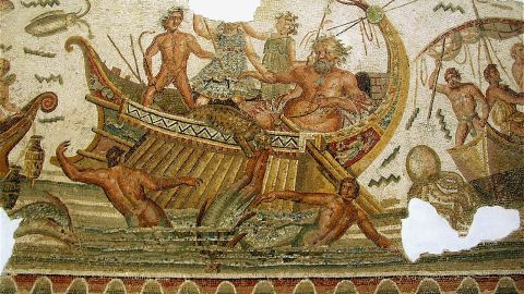 A mosaic depicting Julius Caesar in a boat surrounded by people.