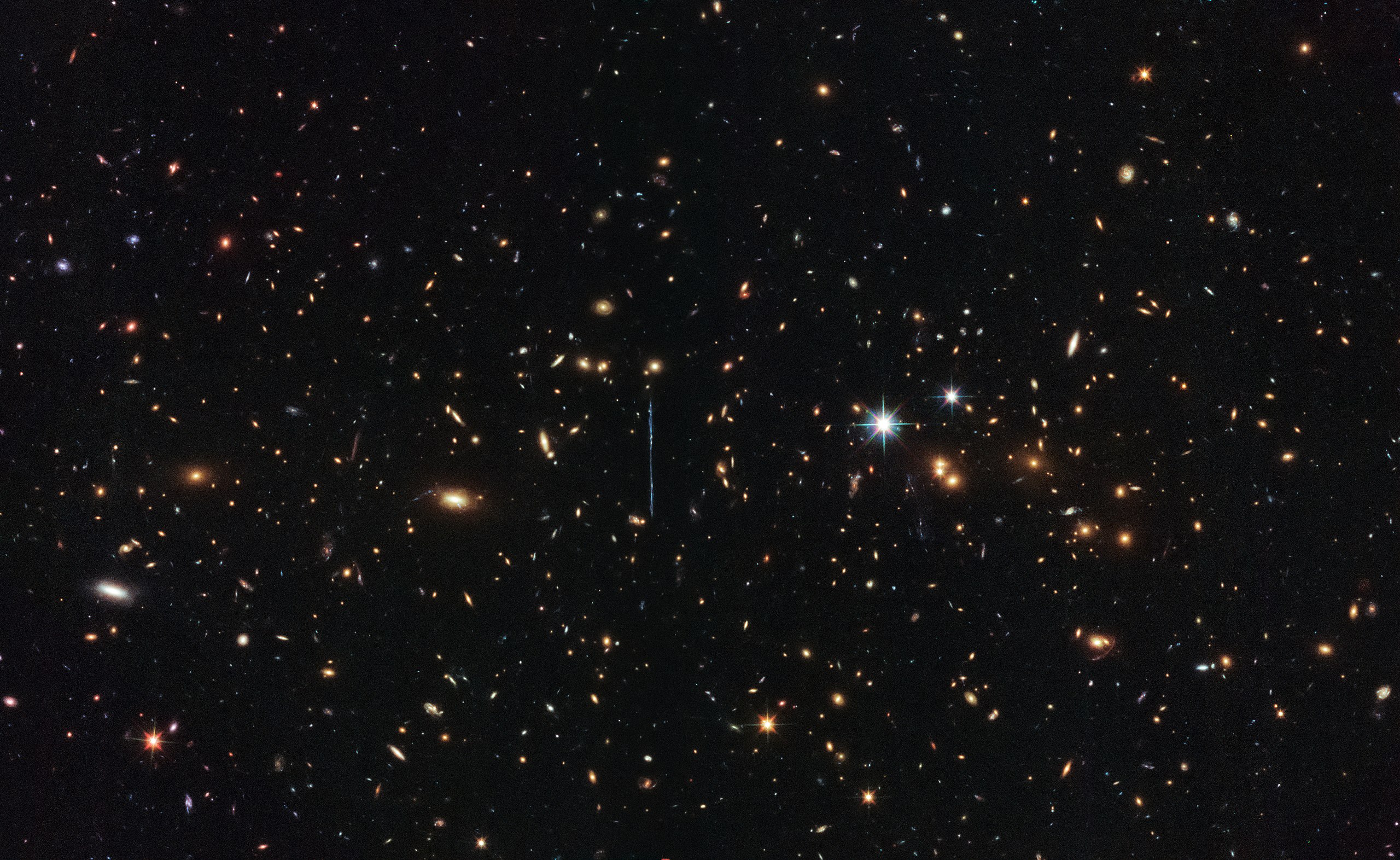 An image of El Gordo, a massive galaxy cluster captured by Hubble