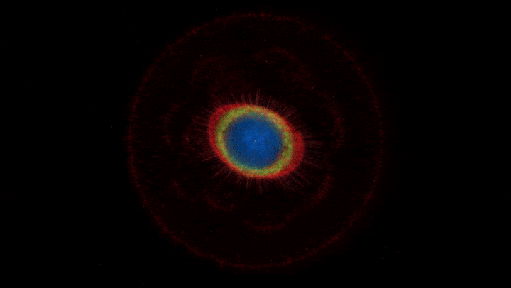 Image of a blue and red ring in the dark.