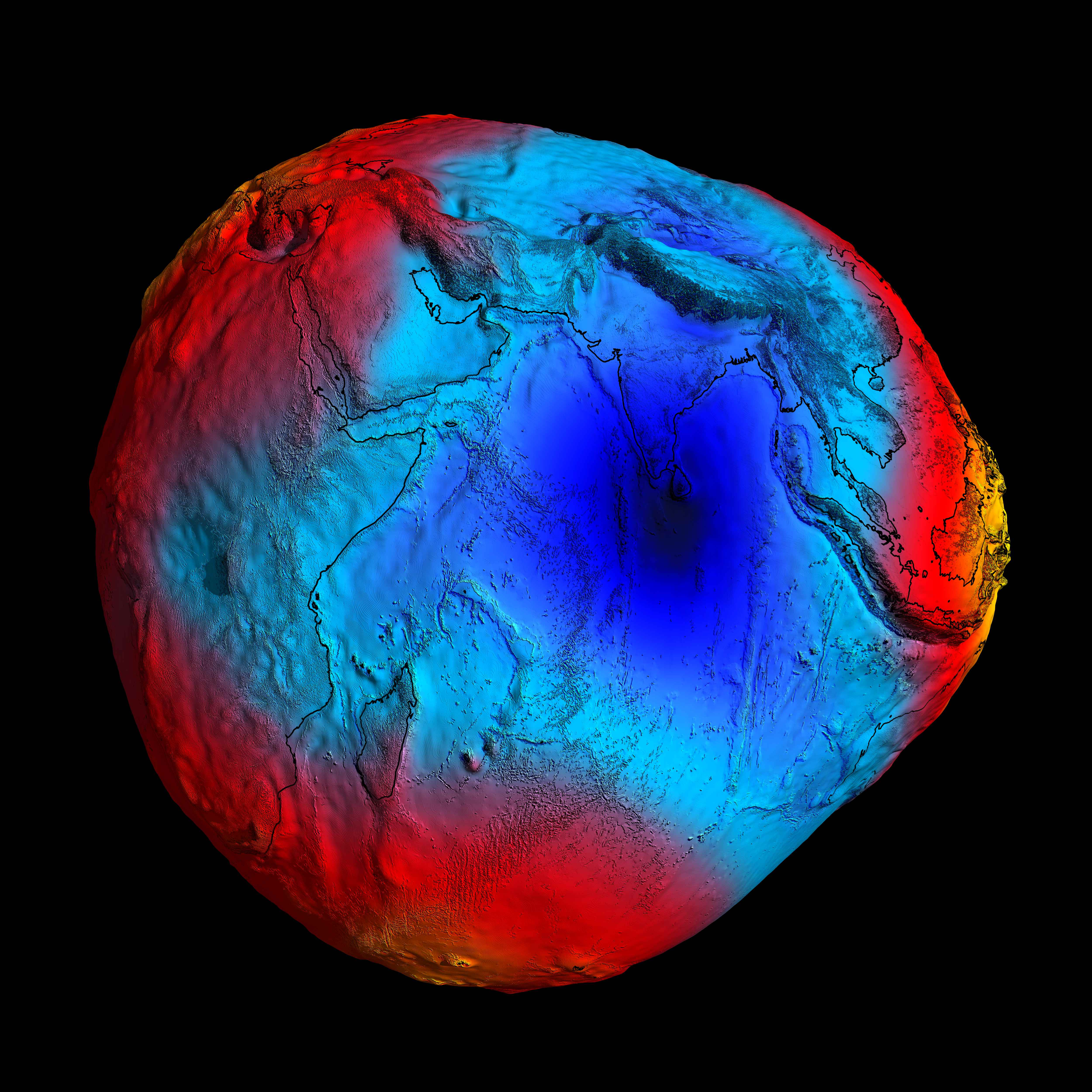An image of a red, blue, and green planet.