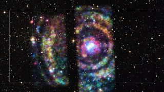 Two spiral galaxies in space.