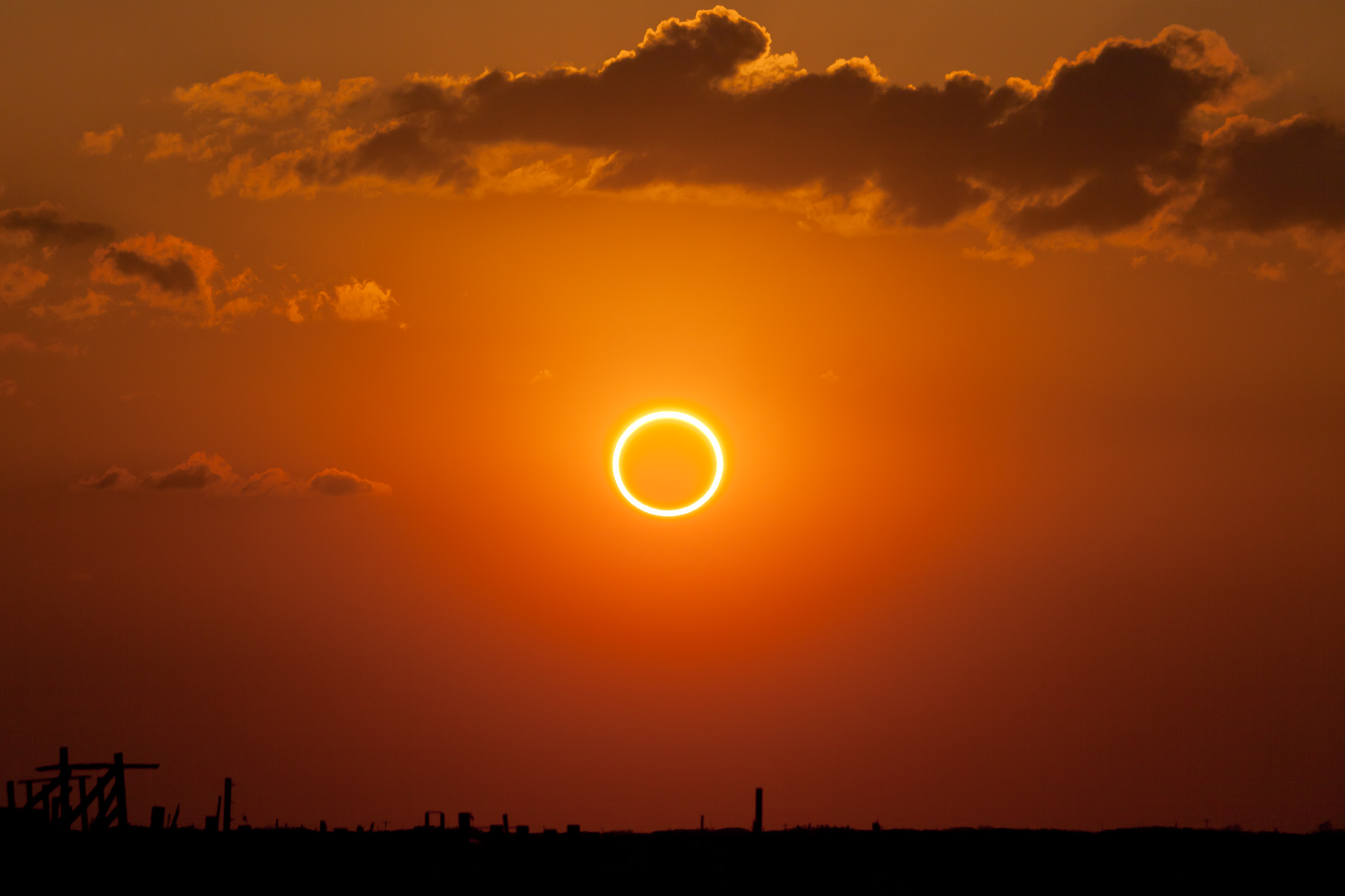 A solar eclipse with a ring in the sky, perfect for eclipse enthusiasts seeking unique activities.