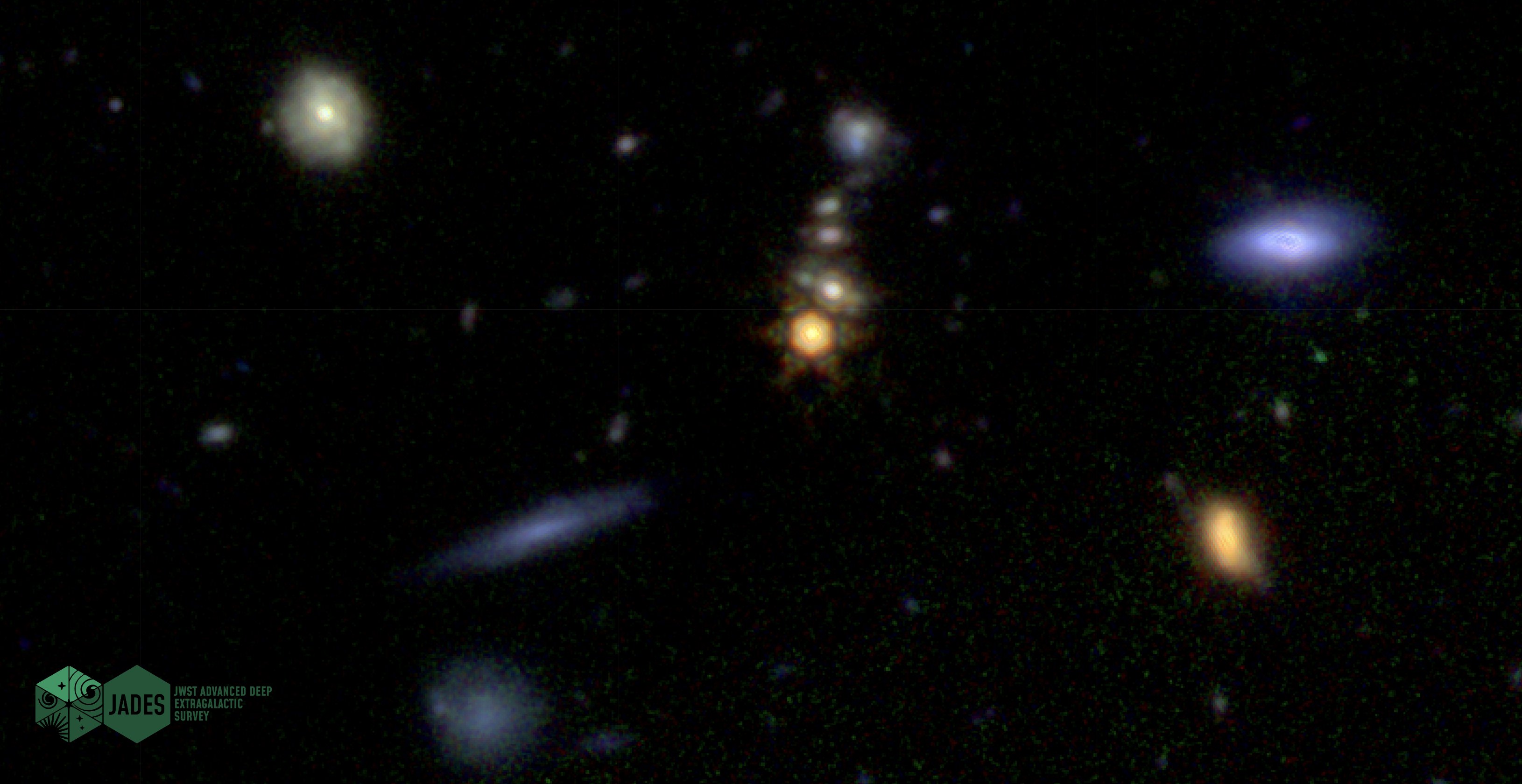 The JWST captures the deepest view yet of a group of galaxies in a dark night sky.