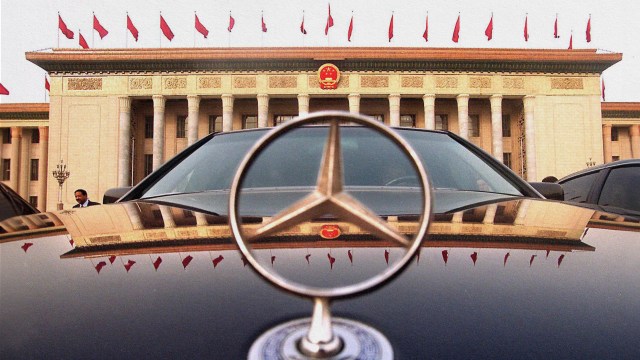 A Mercedes Benz parked in front of a building in Beijing, China.