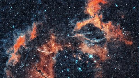 An image of a nebula with stars in it.