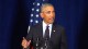 President Barack Obama delivers a persuasive speech from a podium.