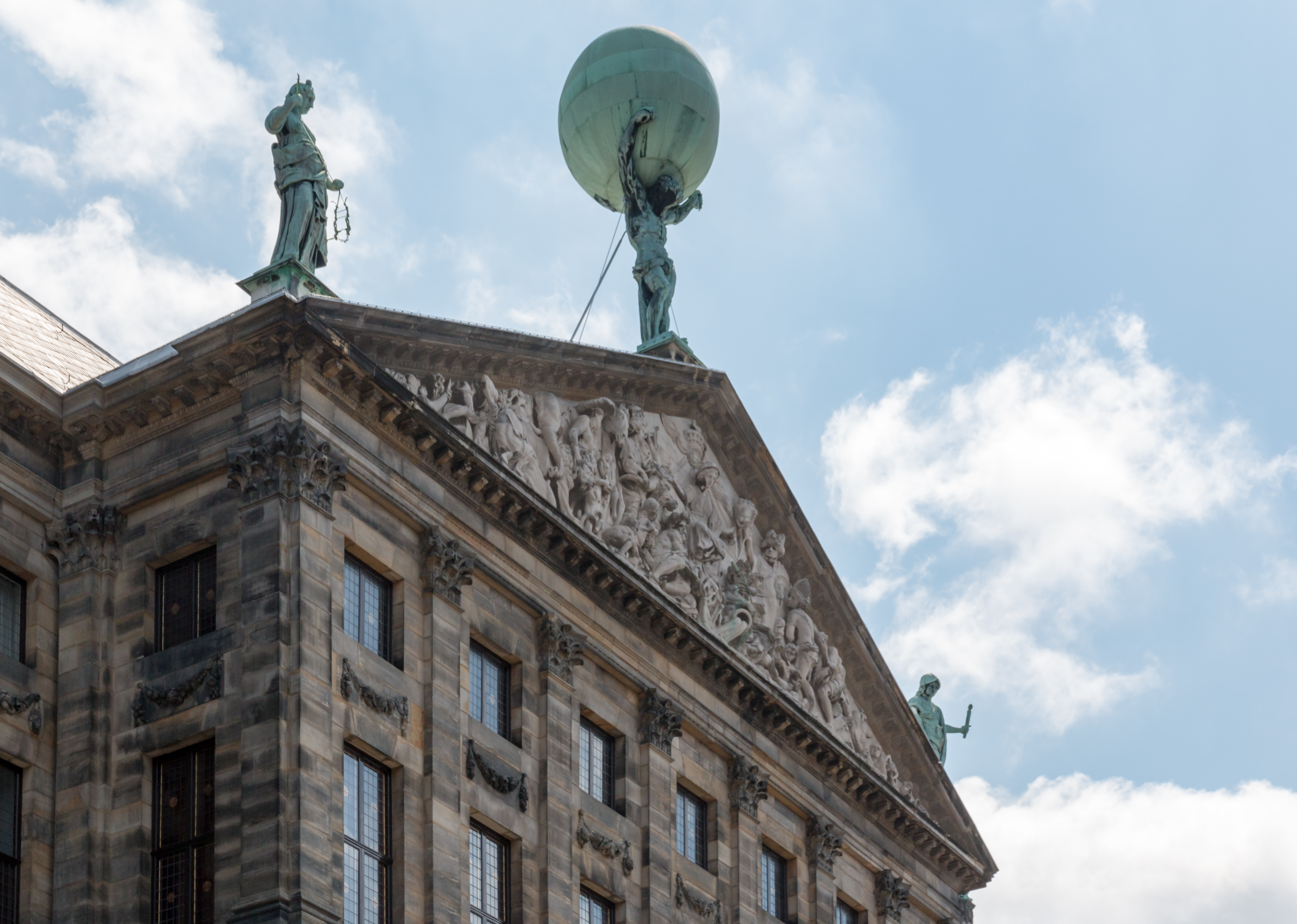 A statue on top of a building.