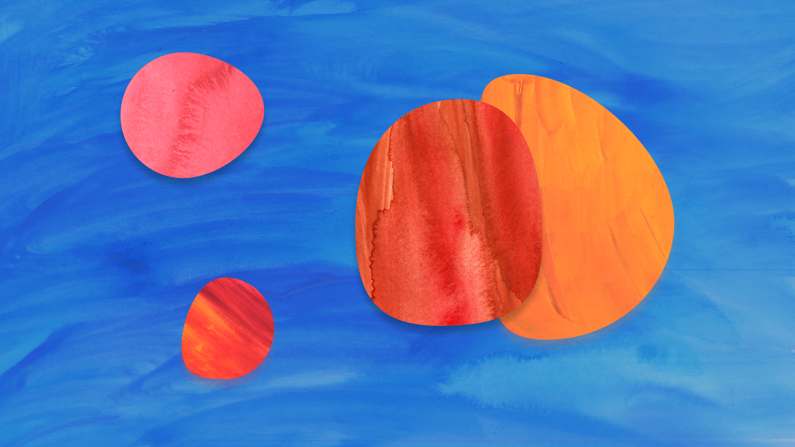 A painting of orange and red circles on a blue background, displaying randomness in its arrangement.