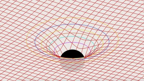 An image of a black hole in the middle of a grid.