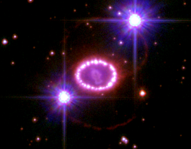 An image of a ring shaped nebula.