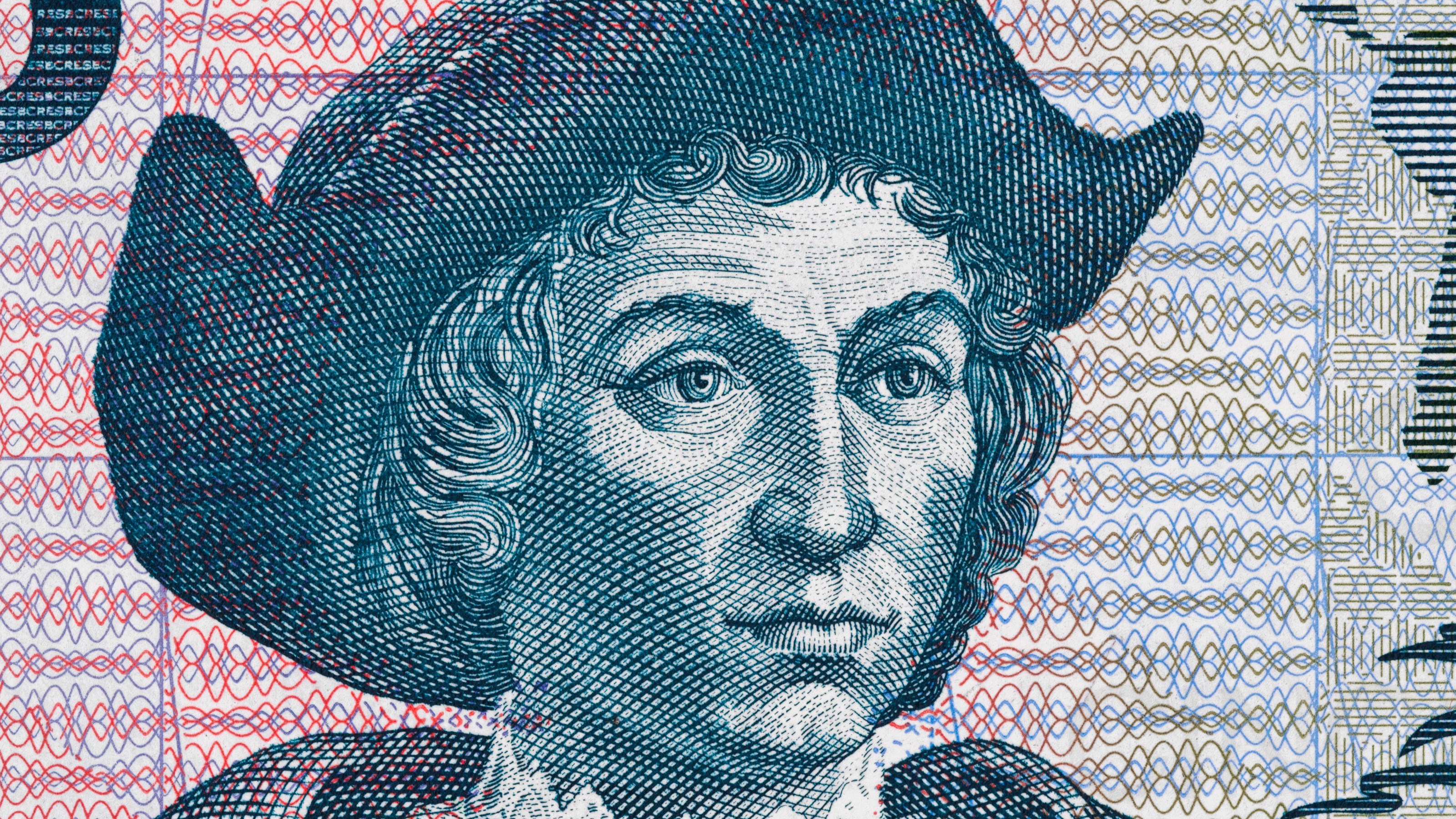 A banknote with a portrait of a man in a hat.