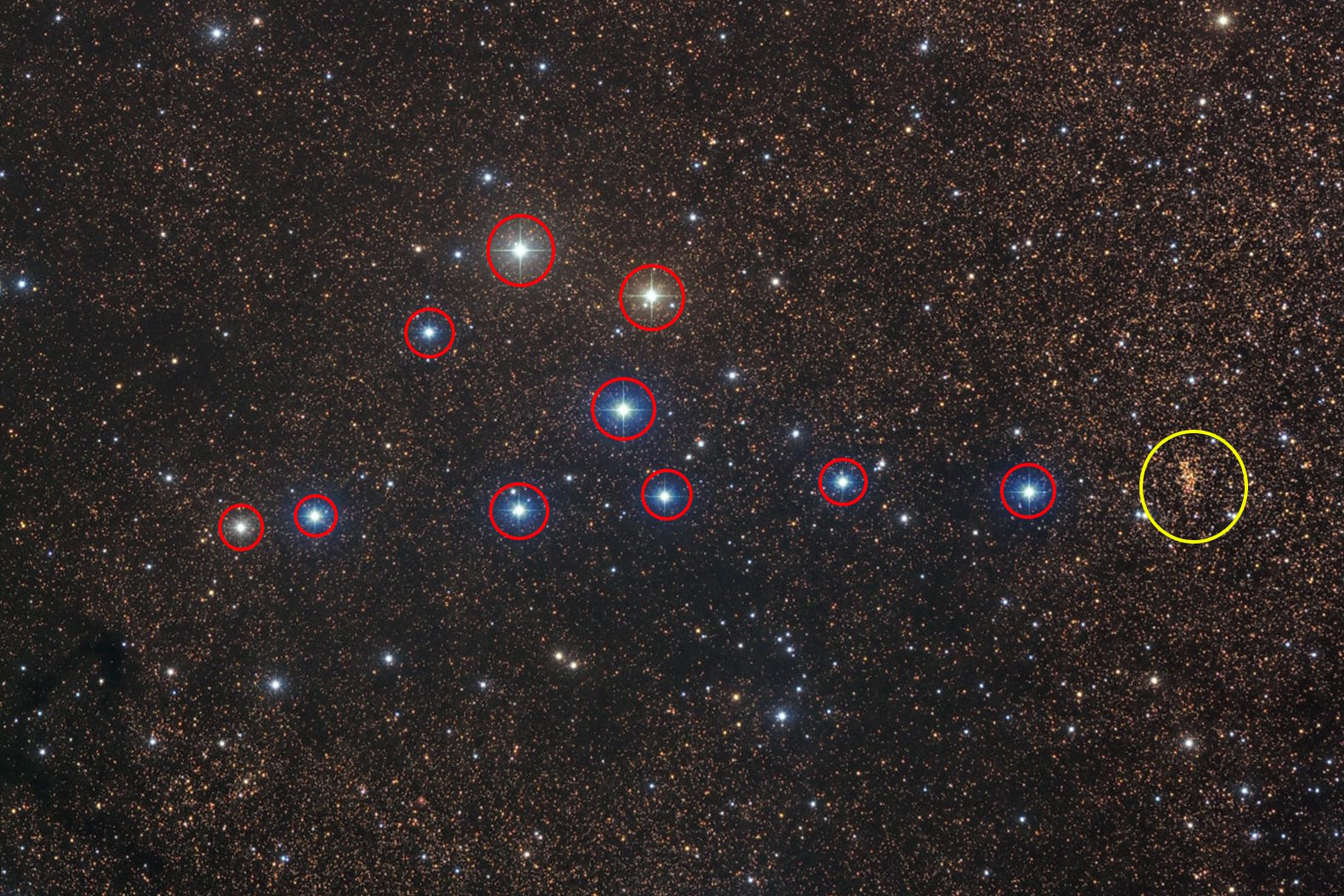 A cluster of stars with a red circle, not real.