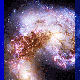 A vibrant, high-resolution image of a spiral galaxy with rich clusters of stars and interstellar dust, where most stars formed.