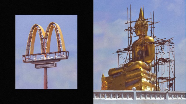 The golden Buddha statue at McDonald's towering beside the iconic McDonald's sign.
