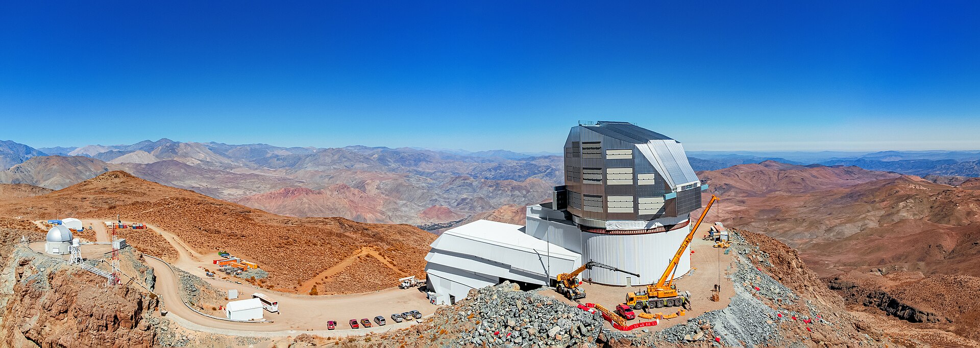 An aerial view of a telescope on top of a mountain.