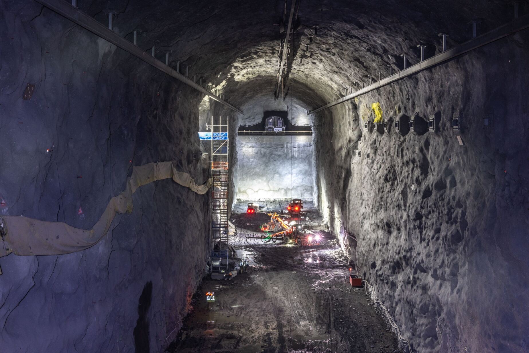 A tunnel is being constructed in the middle of a city.