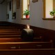 Wooden pews in a church provide a traditional seating option for parishioners.