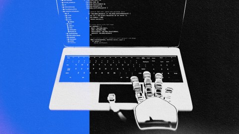 An image of a laptop with an AI software engineer's hand on it.