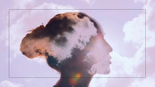 Silhouette of a person with clouds superimposed on the head, creating a dreamy double exposure effect.
