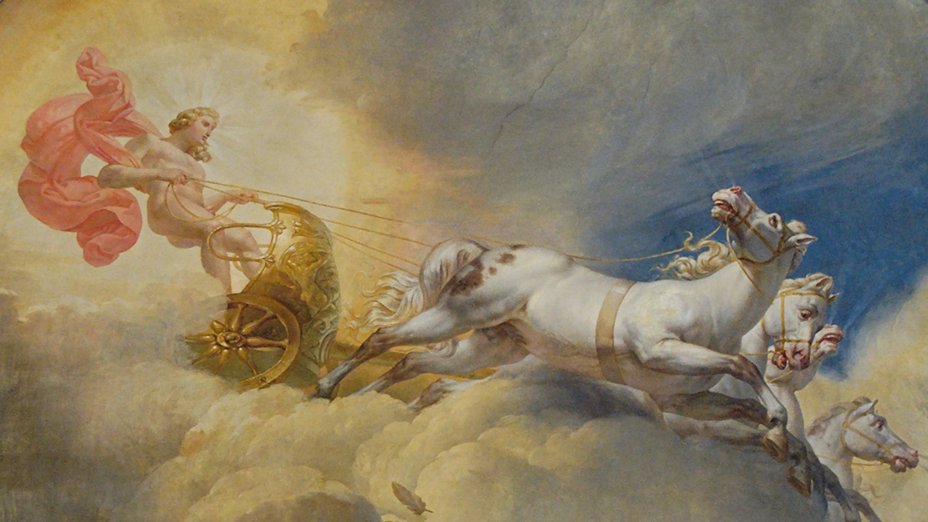 A painting of a mythological figure driving a chariot pulled by two white horses through the clouds, draped in a flowing red fabric, symbolizing executive ego.