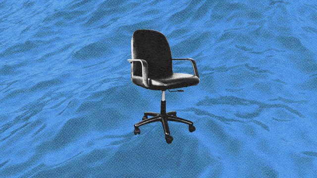 An office chair, symbolizing leadership through volatility, placed on a textured blue background.