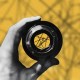 A hand holding a camera lens against a yellow background with shadow patterns, symbolizing problem-solving success.
