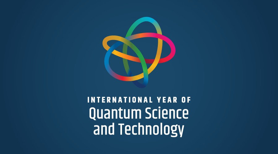 Logo for the International Year of Quantum Science and Technology with multicolored interlocking loops on a dark blue background.