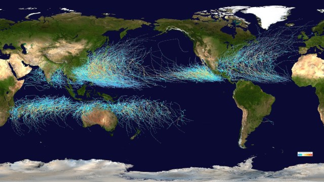 Map of the world showing tropical cyclone tracks from 1985 to 2005. Paths are marked with lines indicating storm movement over time. Dense clusters appear in the North Pacific, North Atlantic, and the Indian Ocean.