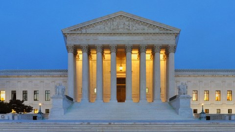The United States Supreme Court building, a neoclassical structure with tall columns.