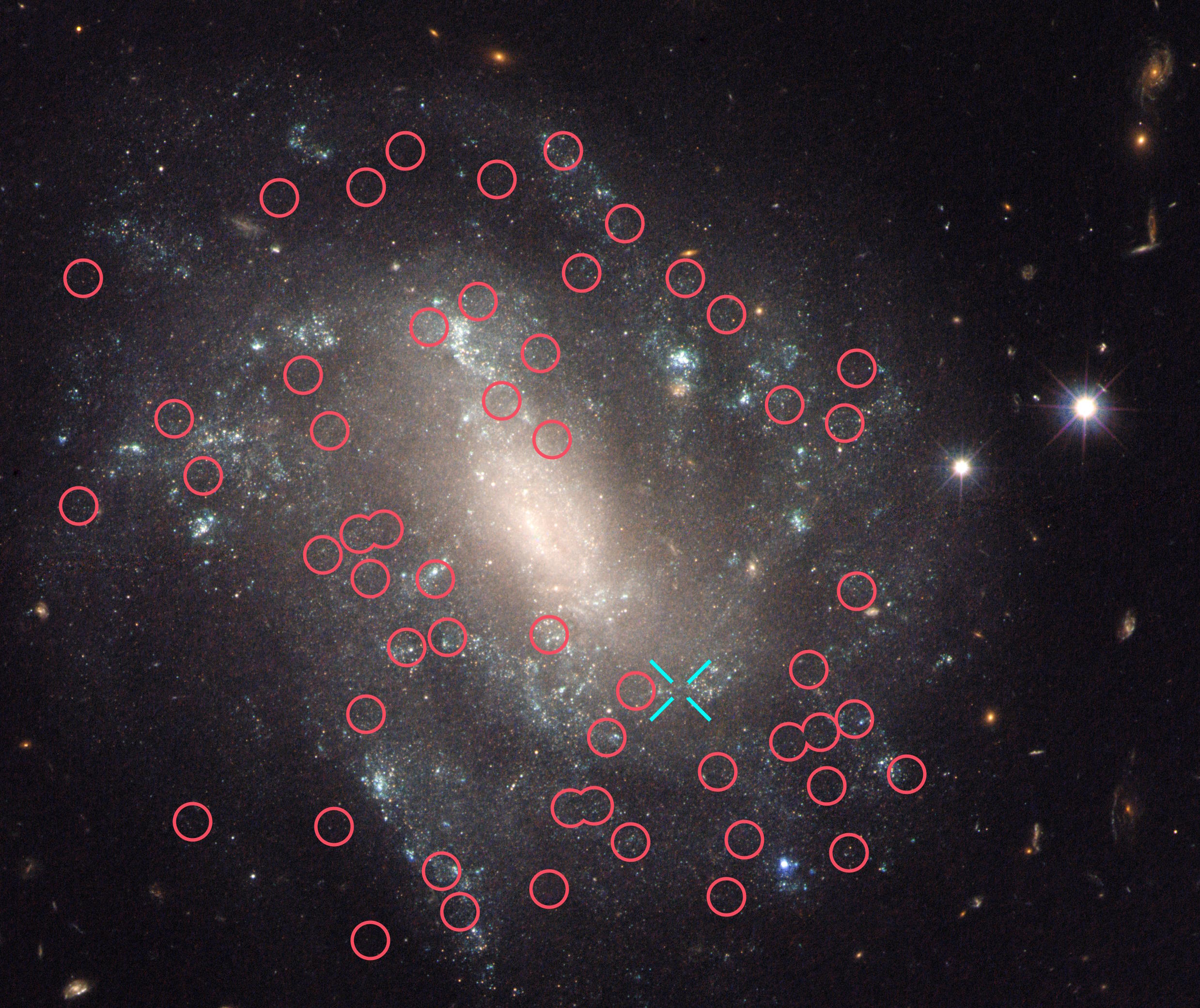 Image of a galaxy with numerous red circles and a cyan cross marked over various points, indicating new measurements or specific features within the galaxy, contributing to the ongoing study of Hubble tension.