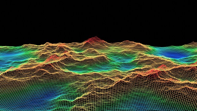 A 3D wireframe representation of mountainous terrain, colored with a gradient from red to blue against a black background.