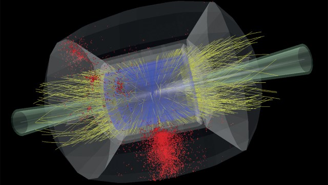 A computer-generated visualization shows particle collision data with yellow lines and red dots against a black background. The simulated particles appear to interact within a transparent geometric shape.