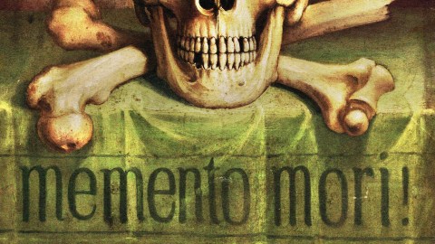 Illustration of a skull with crossed bones on a vibrant green background. The phrase "Memento mori!" is boldly inscribed beneath the skull.